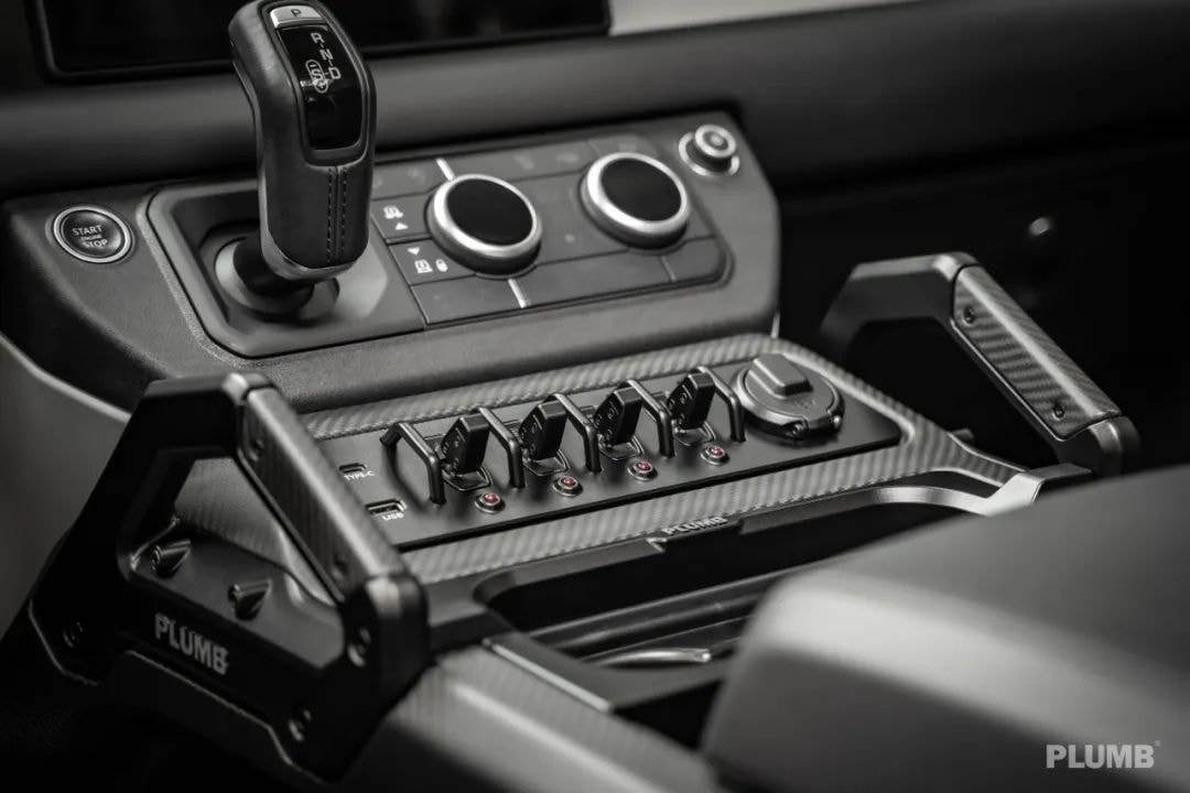 PLUMB M-One Central Armrest Control System — Defender 90/110